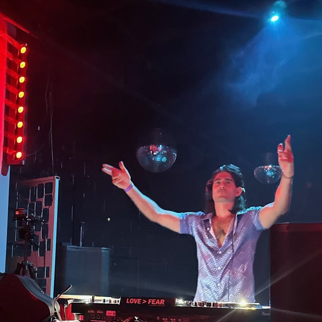 DJ Open House performing at a club