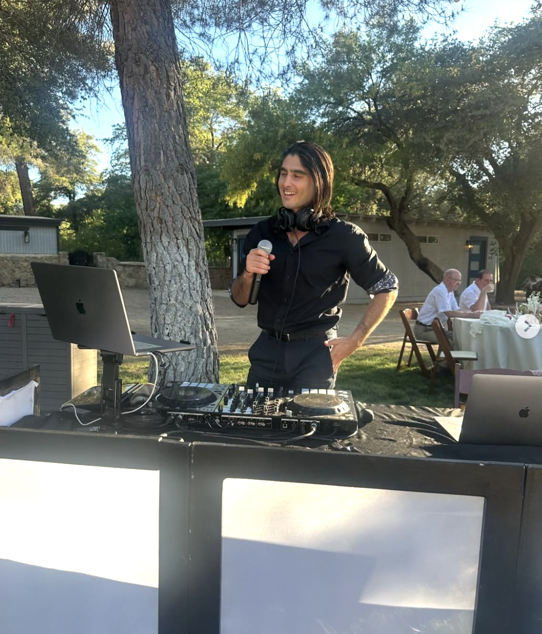 DJ Open House performing with disco balls